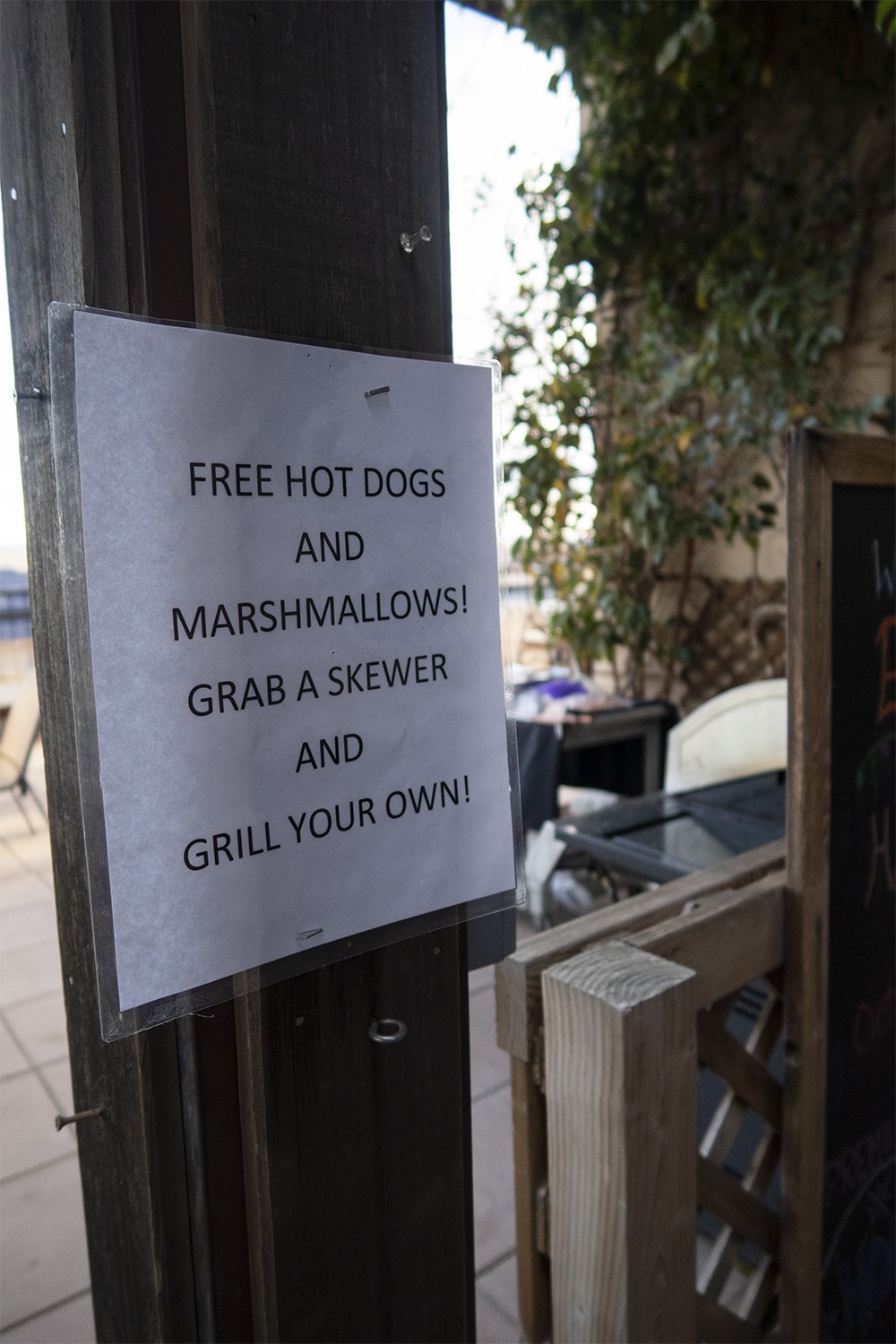 sign saying free hotdogs