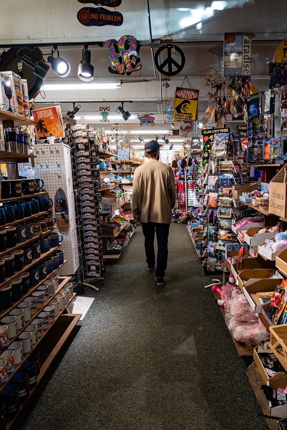 man walking through store in oceanside, oregon